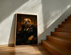 Framed portrait of a bulldog in formal attire leaning against a wall with wooden stairs.
