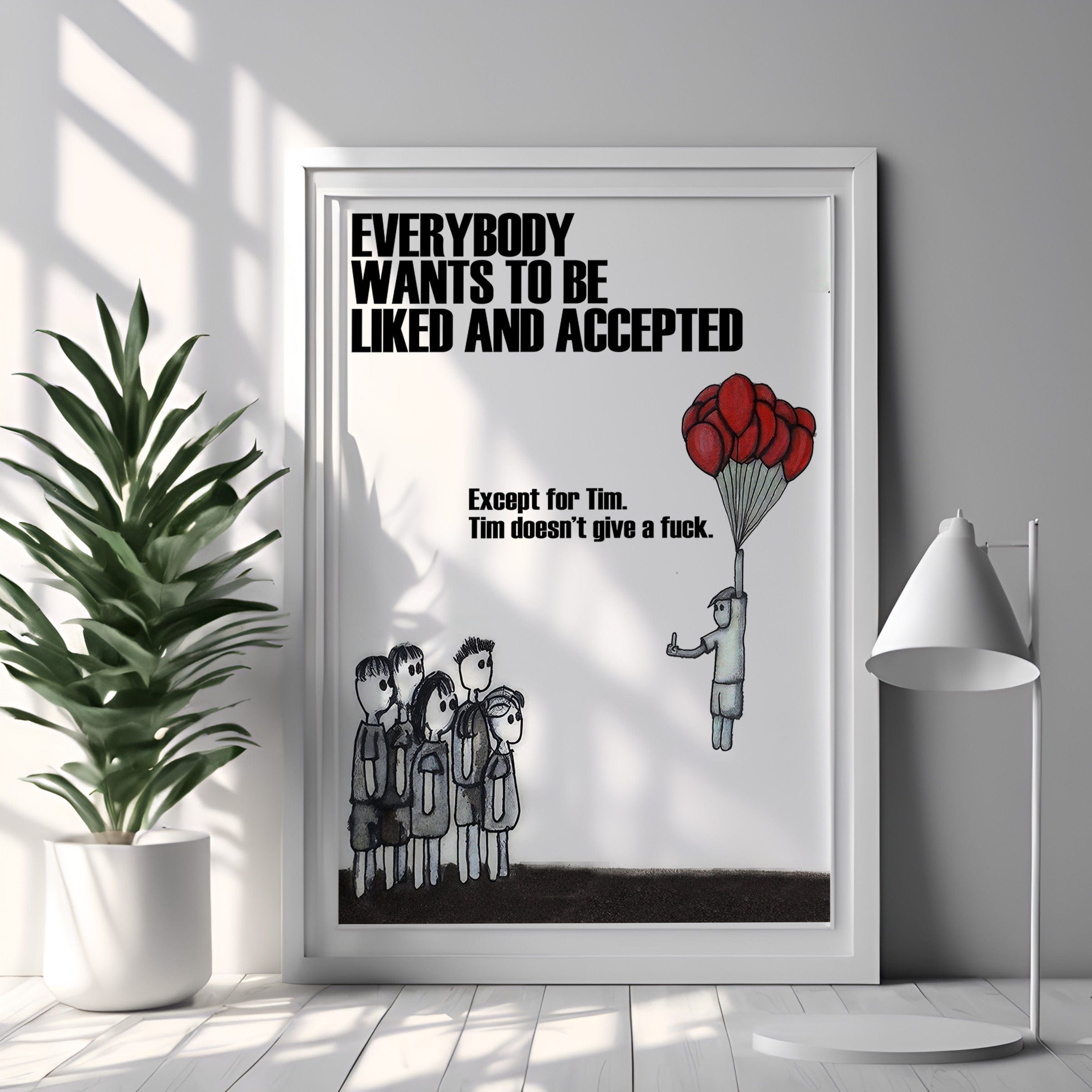 Framed artwork with a humorous quote on a wall in a modern room.
