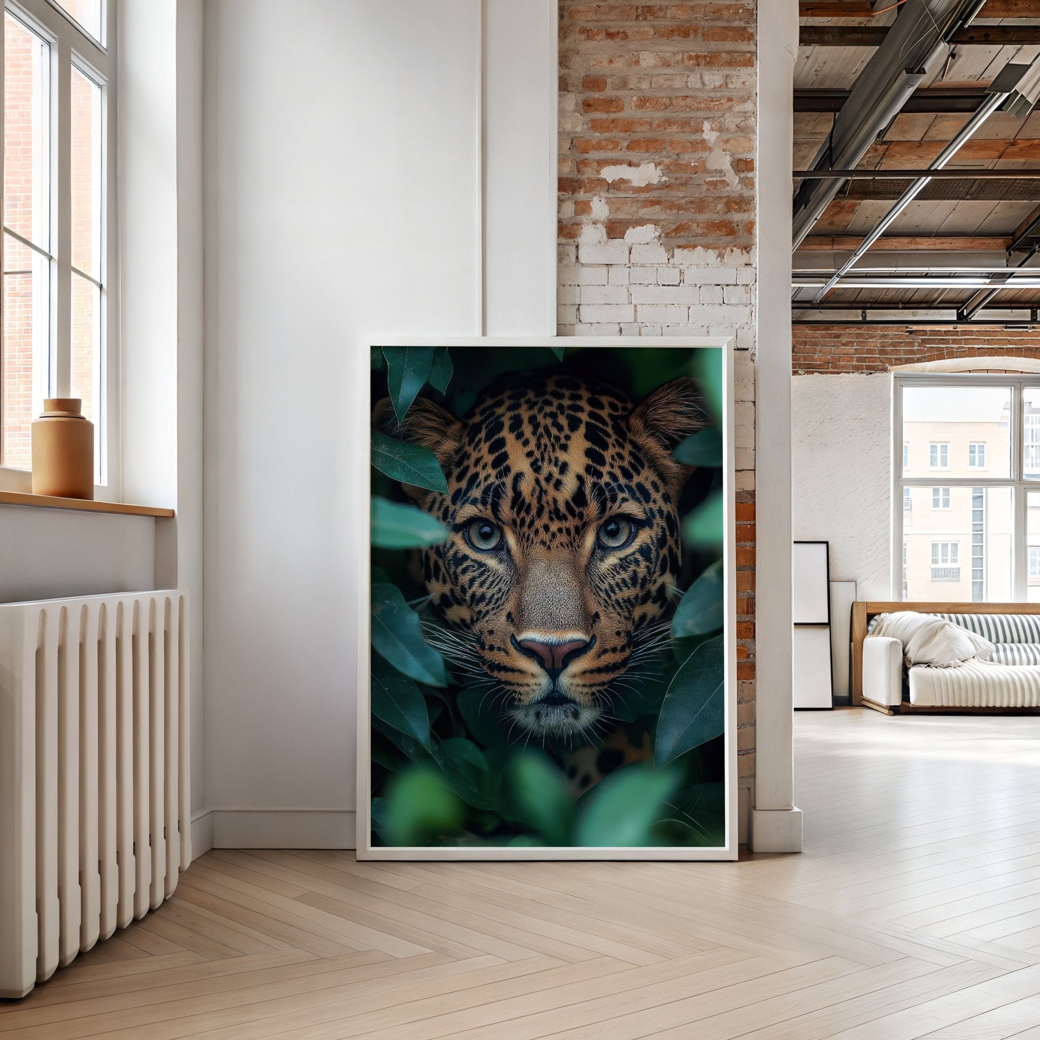 Framed artwork of a leopard surrounded by leaves in a modern living room.