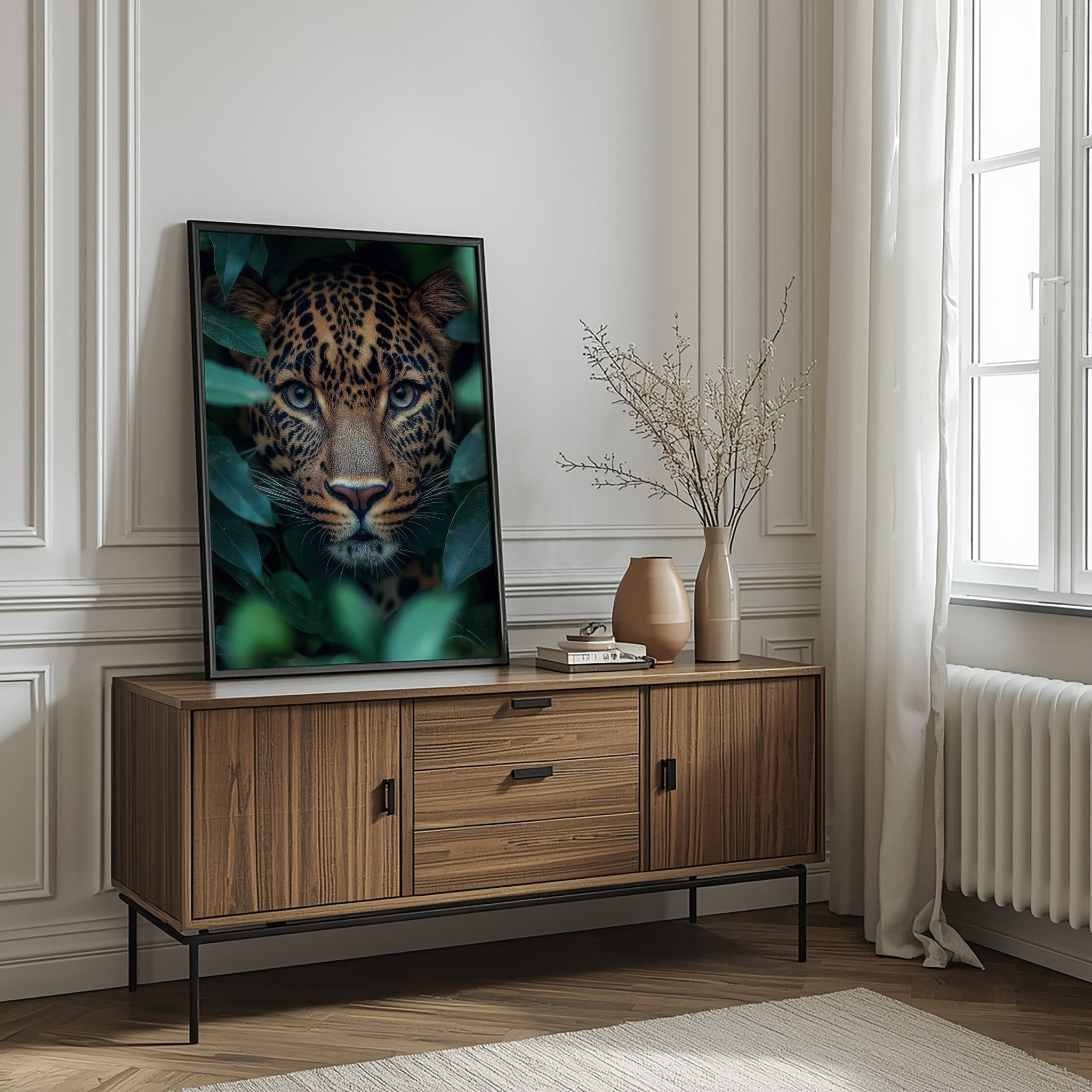 Wooden sideboard with a television displaying a leopard's face in a room with a window and radiator.