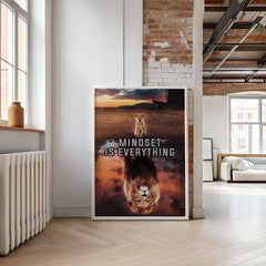 Poster with lions and 'Mindset is Everything' text in a modern living room.