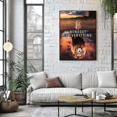 Living room with a white couch, coffee table, and motivational poster on the wall.