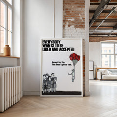 Poster with a black and white illustration and text in a modern room with brick walls and large windows.
