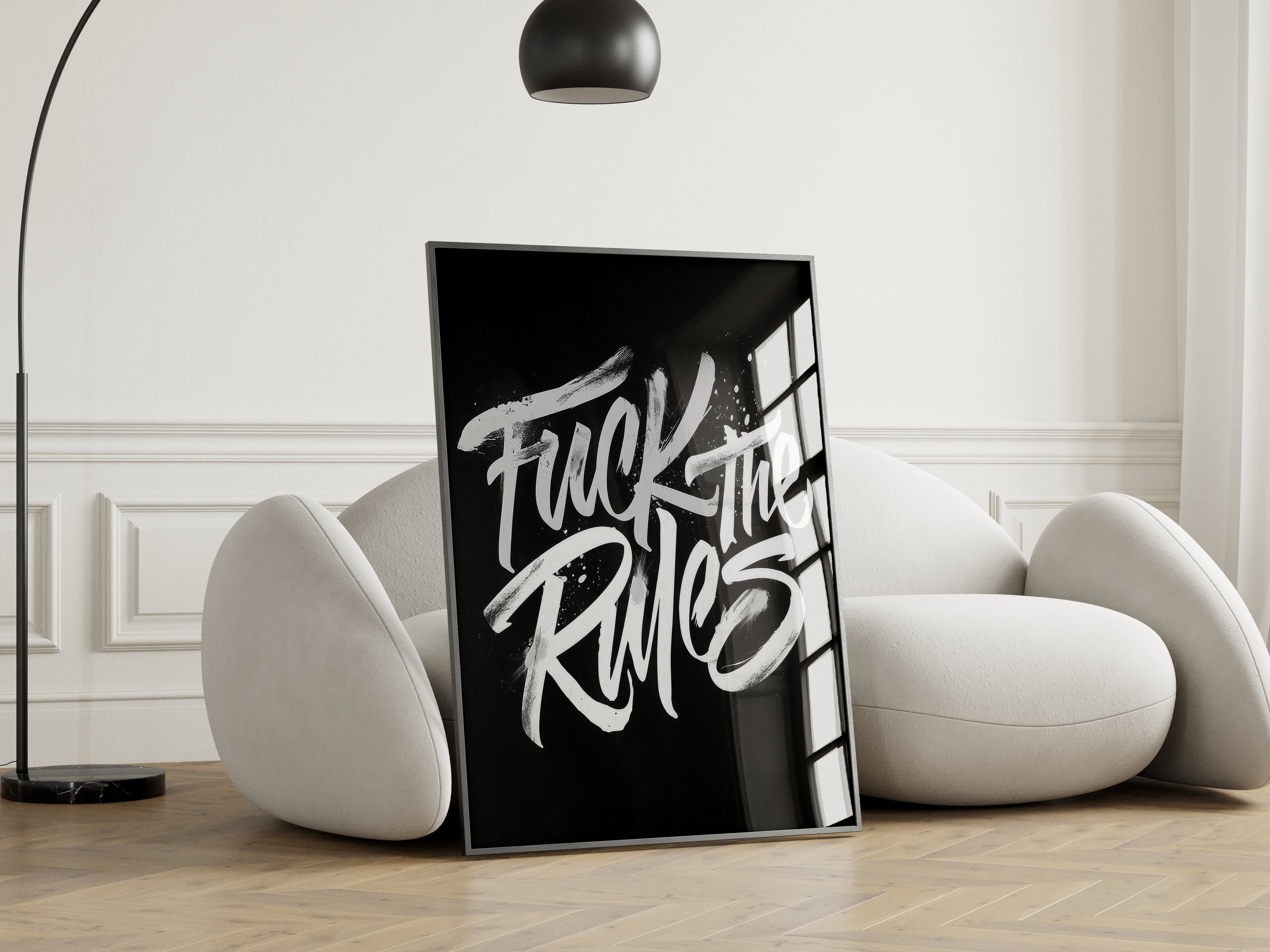 Framed artwork with text in a modern living room setting