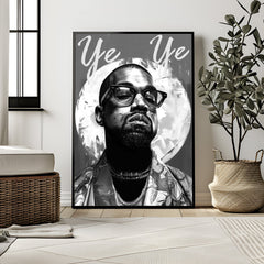 Framed poster of a person with 'Ye Ye' text in a room with decor elements.