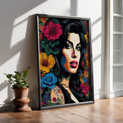Framed colorful artwork of a woman's face with flowers in a room with a plant and wooden floor.