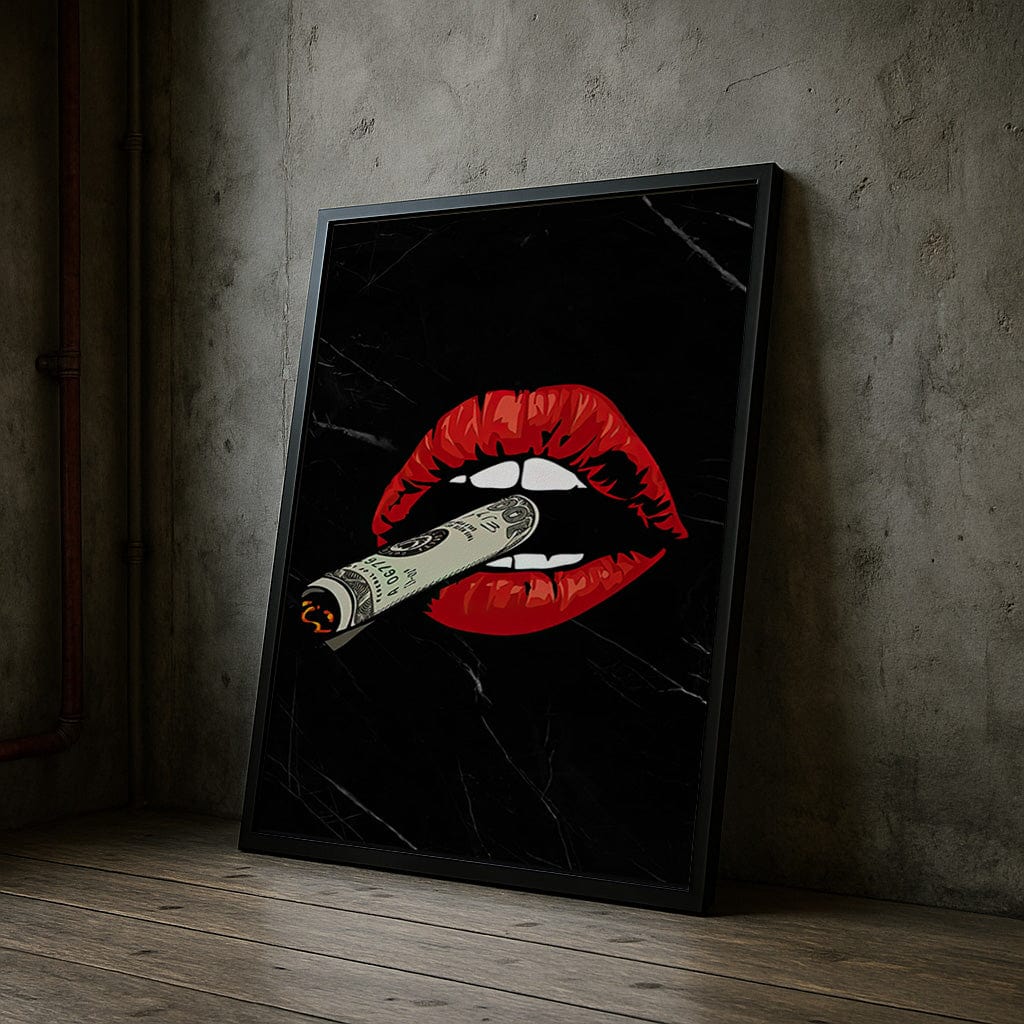 Framed artwork of red lips with a cigarette on a dark background, leaning against a textured wall.