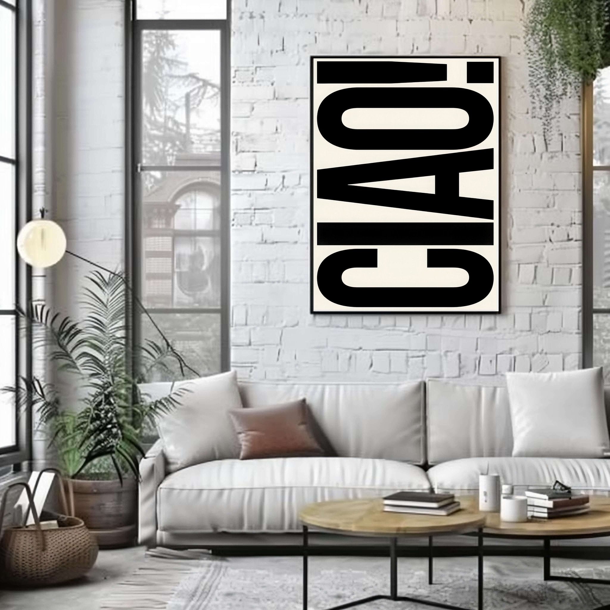 Modern living room with a white sofa, coffee table, and 'CIAO!' poster on a brick wall.