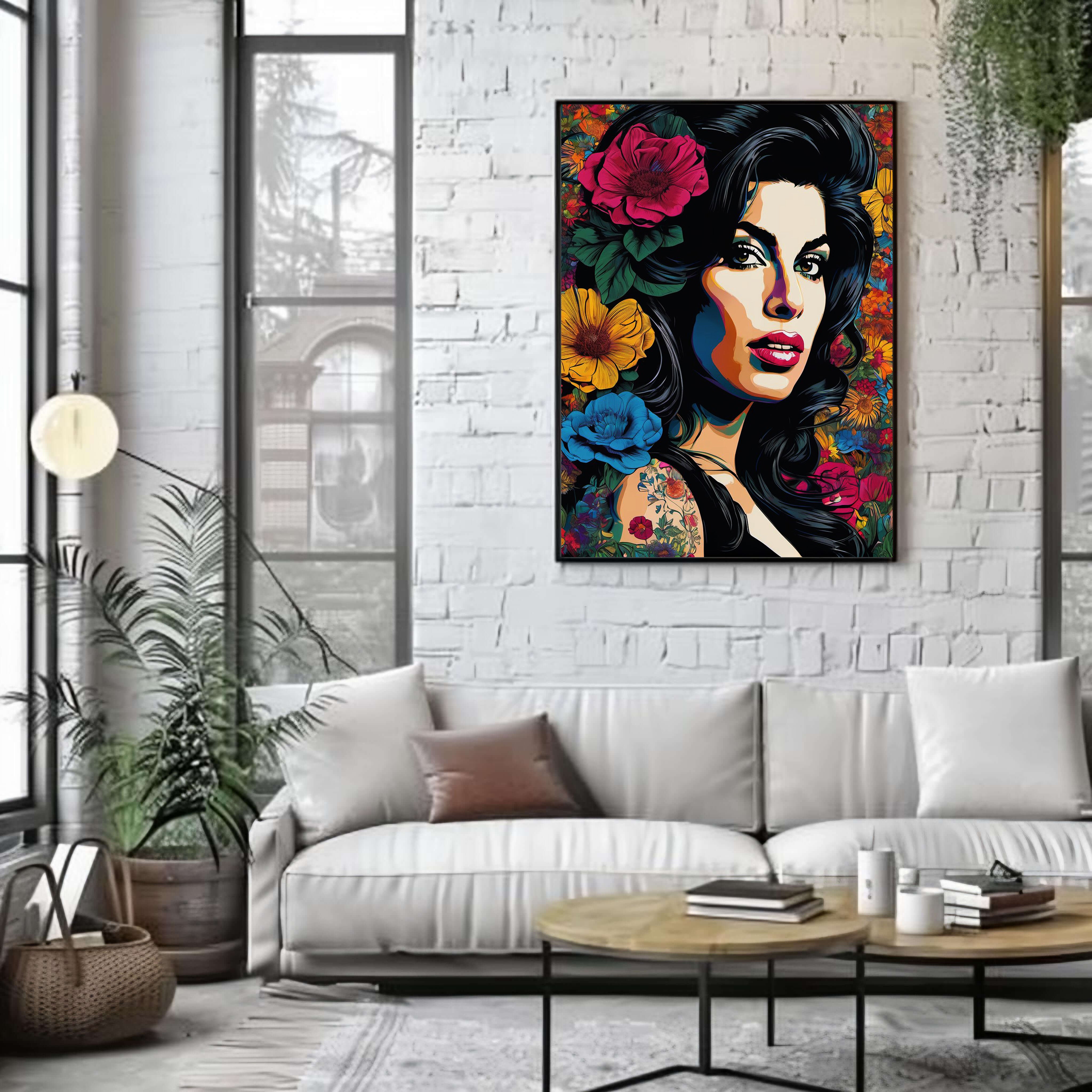Living room with a white sofa, coffee table, and a colorful painting of a woman's face with flowers on the wall.