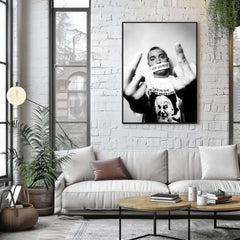 Living room with a white sofa, coffee table, and framed poster on a brick wall.