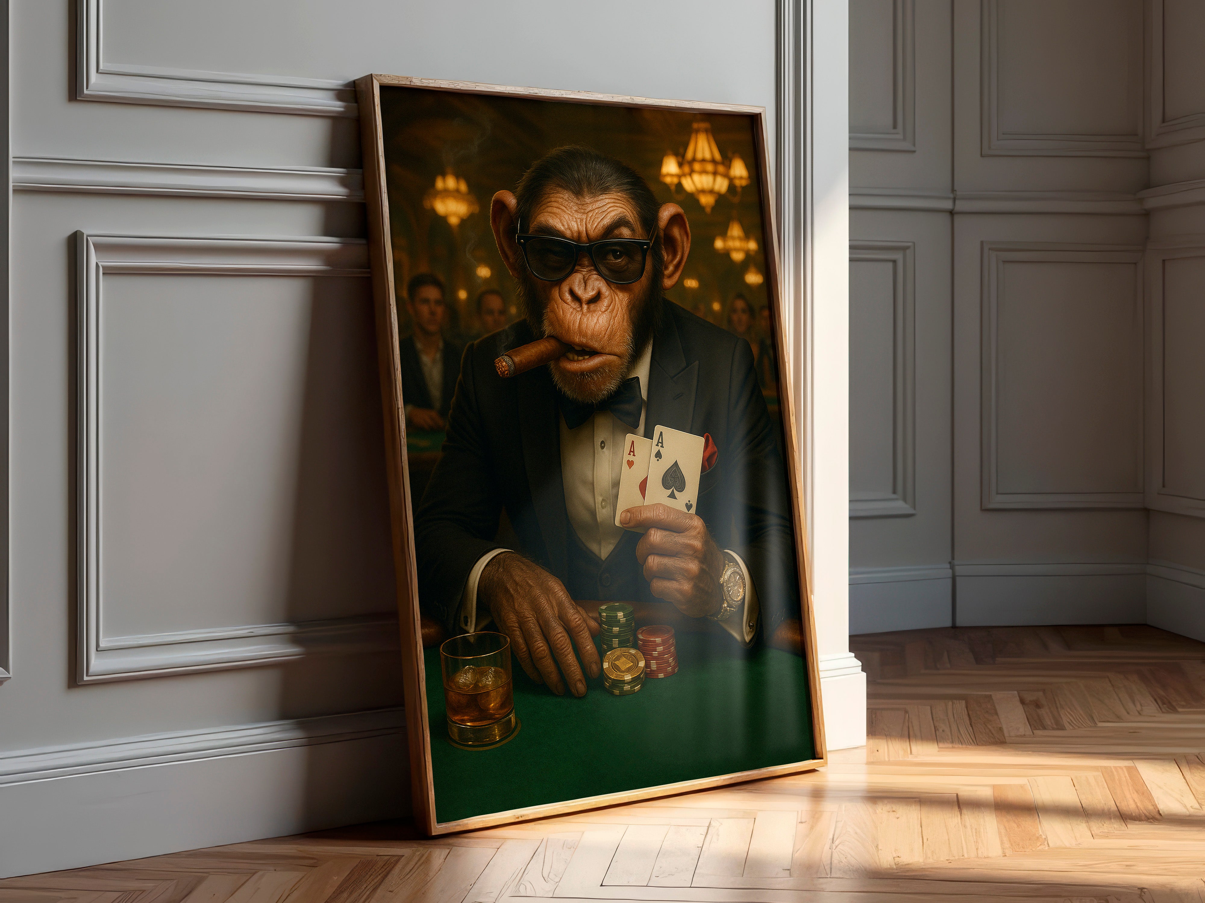 Framed artwork of a monkey in formal attire with playing cards and a glass on a wall.