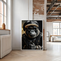 Framed artwork of a gorilla wearing a leather jacket and cap in a modern living room.