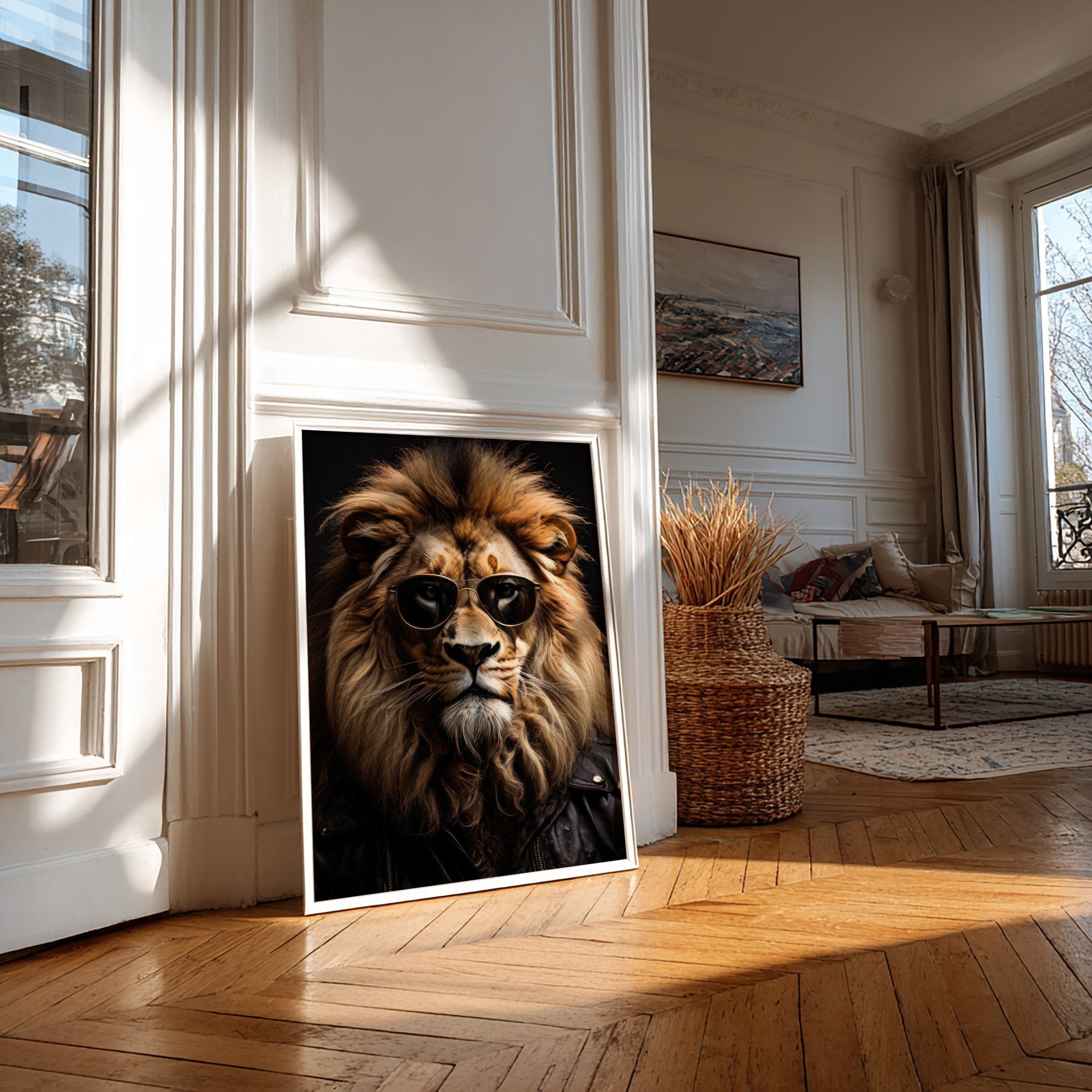 Framed picture of a lion wearing sunglasses on a wall in a sunlit room.