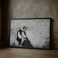maid-sweeping-under-wall-banksy-inspired-poster