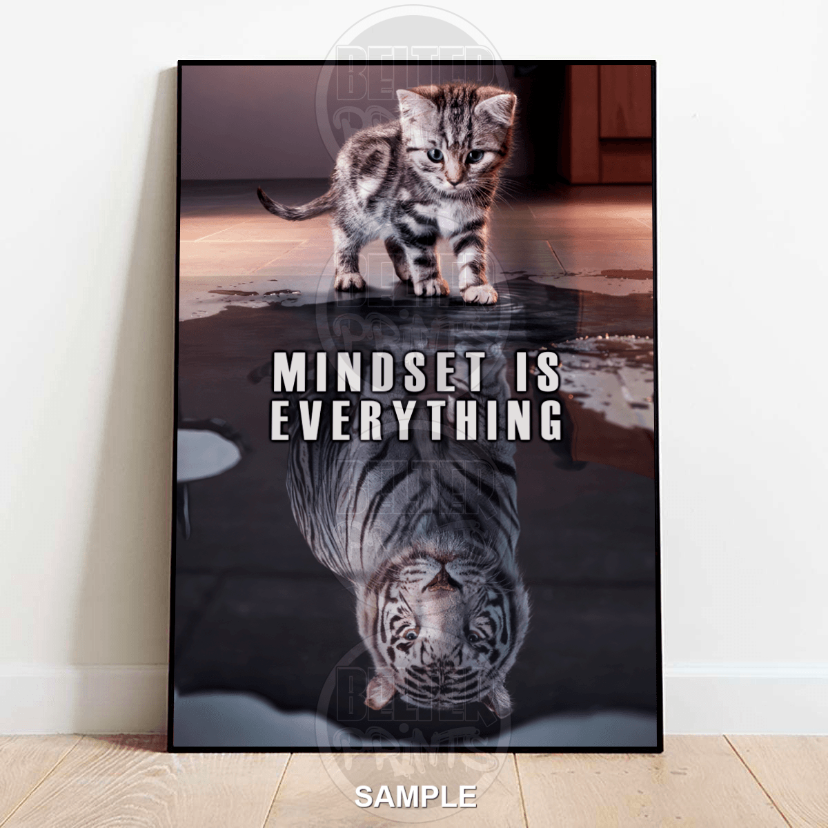 Poster with a kitten and tiger reflection and 'Mindset is Everything' text on a white wall.