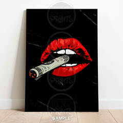 Art print of red lips holding a rolled dollar bill against a black background.